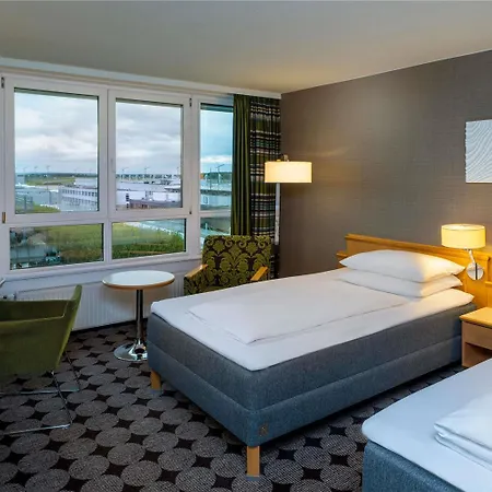 Отель Moevenpick Airport 4*